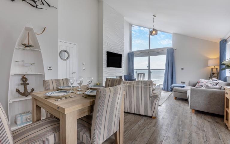 The lounge and dining area in The Waterfront apartment