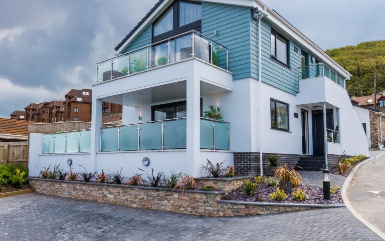 Exterior Photograph of Two Apartments on a Holiday Park