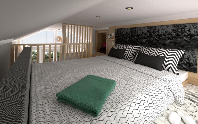 Double Bed Area Upstairs Mezzanine Area of a Pod Style Holiday Home