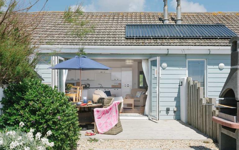 Outside View of a Holiday Home including Outdoor Dinning area