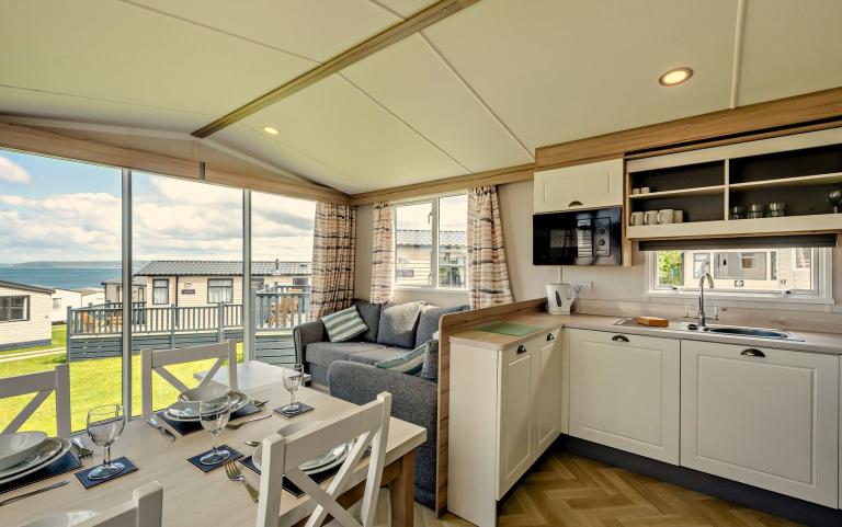 Lounge and Dining Area in a Caravan Holiday Home with Sea Views