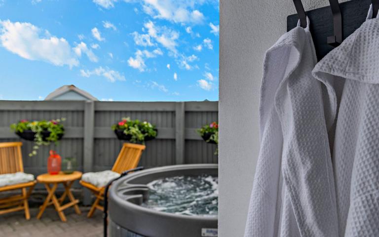 Bathrobes & Hottub in the Outdoor Living Area