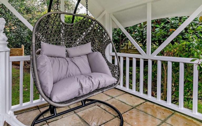 Swing Chair in a Garden of a Holiday Home