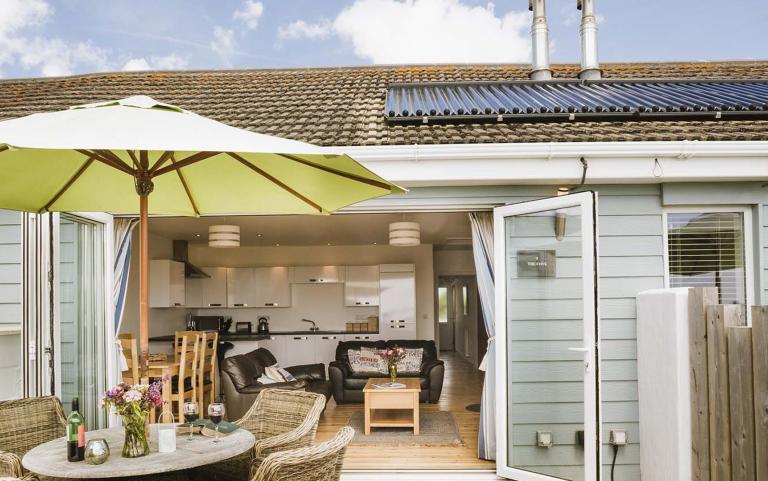 Outside View of a Holiday Home including Outdoor Dinning area