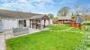 Outdoor View of Cottage in Beautiful Gardens 