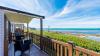 Outside Decking Area of a Caravan Holiday Home with Views over the Sea and Sea Pool