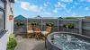 Hot Tub & Seating Area of Waters Edge 2 Bedroom Apartment