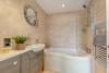 Main bathroom of Waterfront apartment with jacuzzi bath