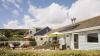 Outside View of a Holiday Home including Outdoor Dinning area